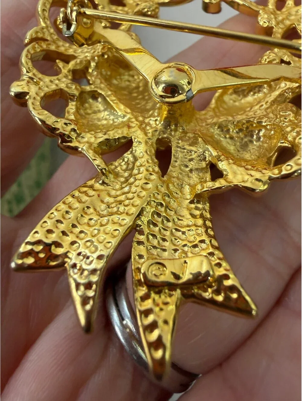 Vintage JJ Gold Tone Wreath Brooch with Bow and Rhinestones